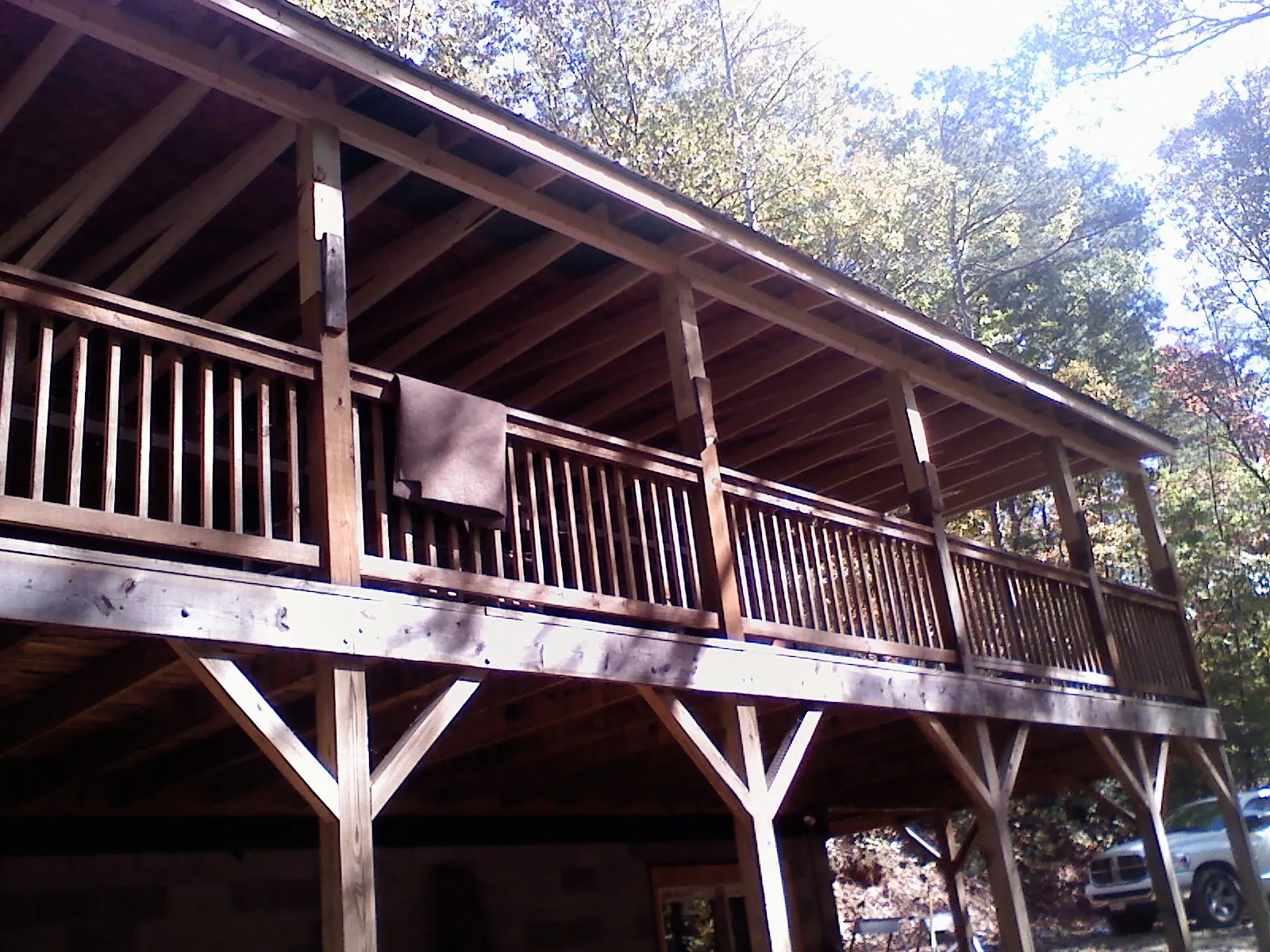 Timber framing under a new elevated porch and deck — Roof Leak Repair in Champlin by Roofing Brothers
